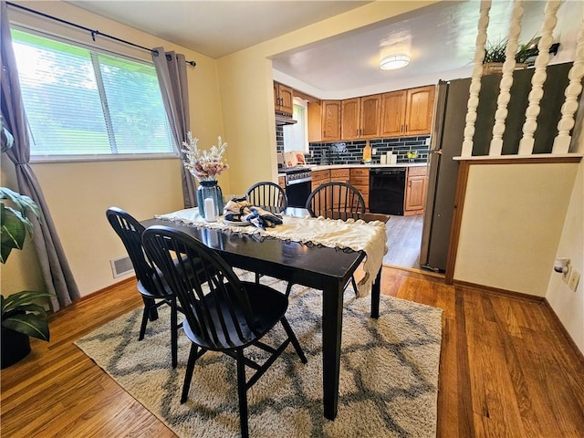 116 Bellwood Rd, West Mifflin, PA 15122 - dining room with light wood-style floors