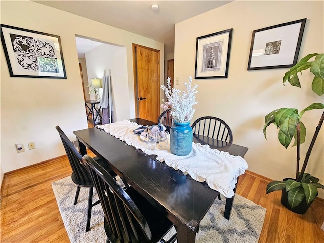 116 Bellwood Rd, West Mifflin, PA 15122 - dining area featuring wood finished floors and baseboards