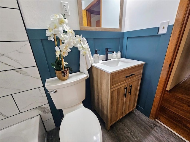 116 Bellwood Rd, West Mifflin, PA 15122 - bathroom featuring vanity, toilet, and wood finished floors