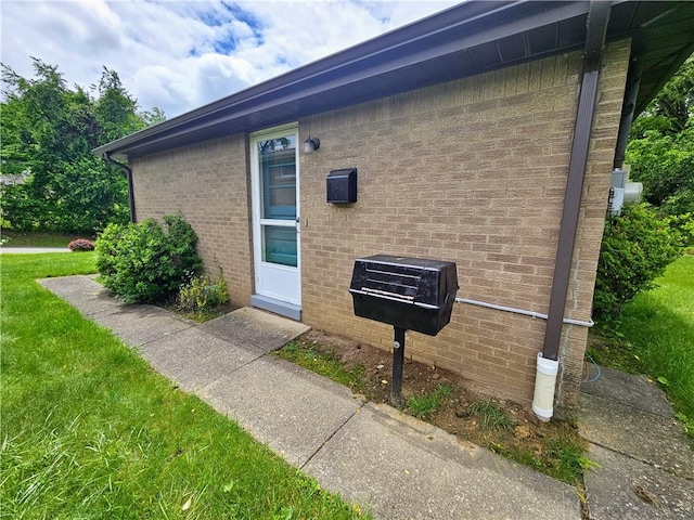 116 Bellwood Rd, West Mifflin, PA 15122 - view of side of property featuring brick siding and a yard