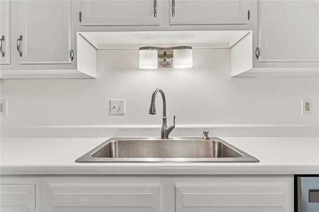 2708 Bingham Dr, Upper St Clair, PA 15241 - kitchen with a sink, light countertops, and white cabinetry