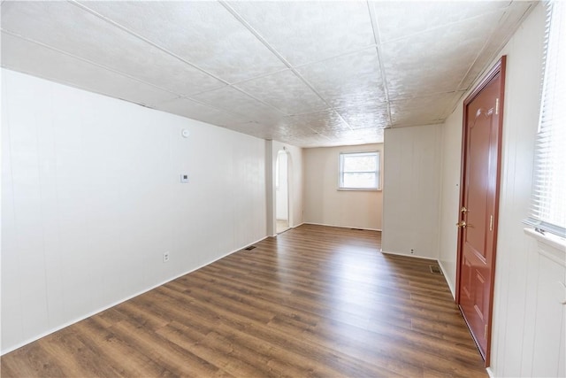 619 1st St, Verona, PA 15147 - unfurnished room featuring dark wood-style floors and arched walkways