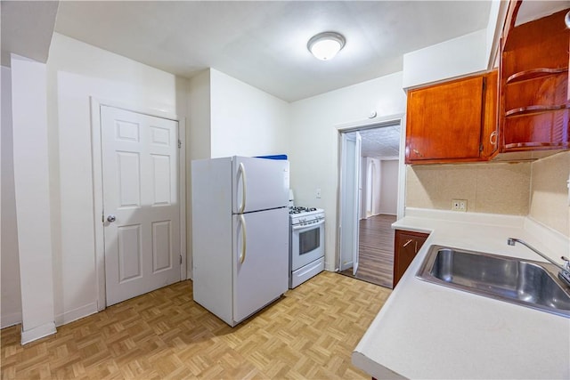 619 1st St, Verona, PA 15147 - kitchen featuring white appliances, light countertops, a sink, and open shelves