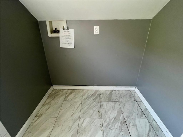 223 Division Ave, Ellwood City Law, PA 16117 - empty room with marble look tiles and baseboards