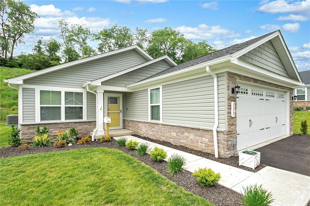 339 Nelson Dr, Monroeville, PA 15146 - craftsman-style home with stone siding, a garage, driveway, and a front lawn
