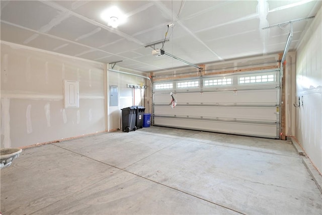 339 Nelson Dr, Monroeville, PA 15146 - garage with a garage door opener and electric panel