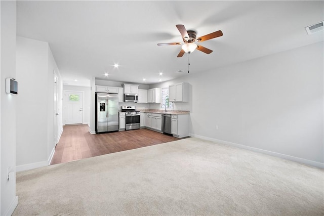 339 Nelson Dr, Monroeville, PA 15146 - kitchen featuring stainless steel appliances, carpet floors, a ceiling fan, baseboards, and recessed lighting