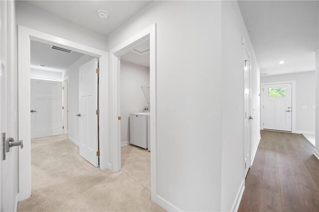339 Nelson Dr, Monroeville, PA 15146 - hallway with washer / dryer and baseboards