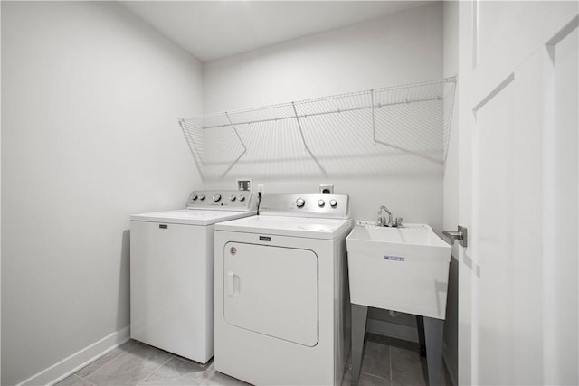 339 Nelson Dr, Monroeville, PA 15146 - washroom featuring washing machine and clothes dryer and baseboards