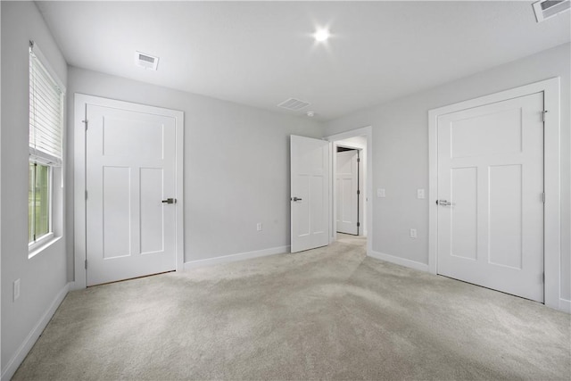 339 Nelson Dr, Monroeville, PA 15146 - unfurnished bedroom with baseboards and light carpet
