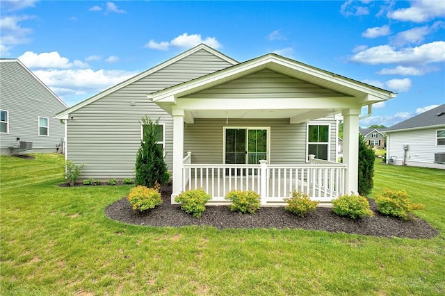 339 Nelson Dr, Monroeville, PA 15146 - back of property featuring covered porch, a yard, and central air condition unit