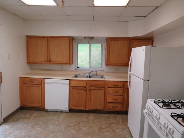 3921 Portman Ave, Observatory Hill, PA 15214 - kitchen with white appliances, a drop ceiling, light countertops, and brown cabinets