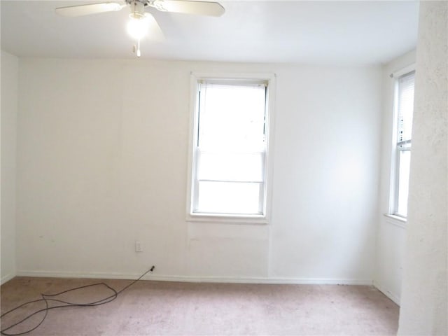 3921 Portman Ave, Observatory Hill, PA 15214 - empty room featuring healthy amount of natural light, ceiling fan, and light colored carpet