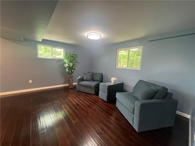 1601 Burchfield Rd, Shaler, PA 15101 - living area with healthy amount of natural light, dark wood-style floors, and baseboards