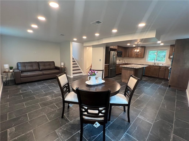 1601 Burchfield Rd, Shaler, PA 15101 - dining room with stairs, recessed lighting, and dark marble finish flooring