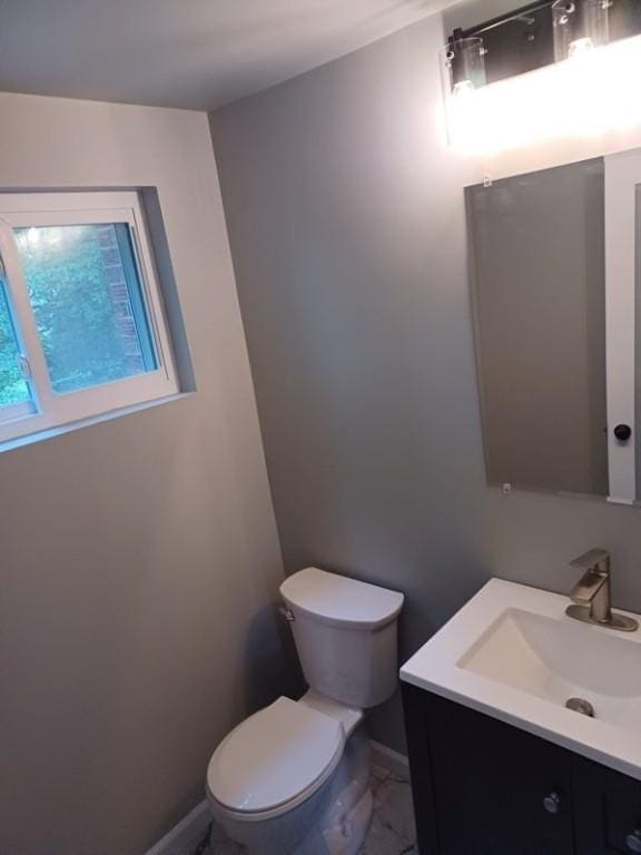 1601 Burchfield Rd, Shaler, PA 15101 - bathroom featuring toilet, vanity, baseboards, and marble finish floors