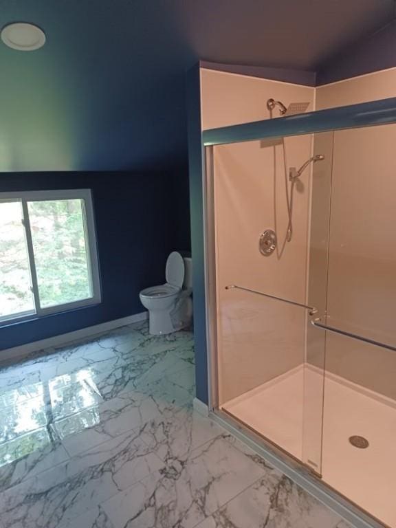 1601 Burchfield Rd, Shaler, PA 15101 - bathroom with marble look tiles, a shower stall, and toilet