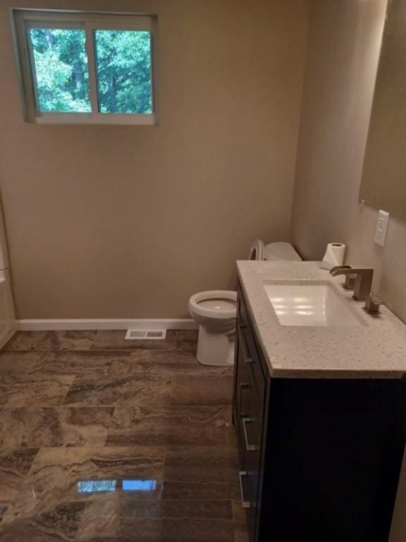 1601 Burchfield Rd, Shaler, PA 15101 - bathroom with vanity, toilet, and baseboards