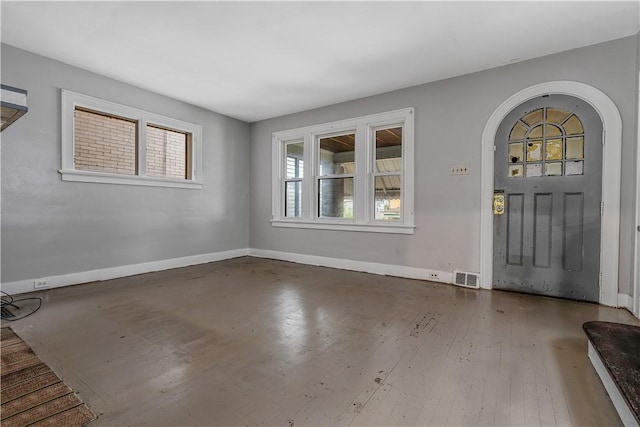 122 Margaret St, Mount Oliver, PA 15210 - entryway with wood-type flooring, baseboards, and arched walkways
