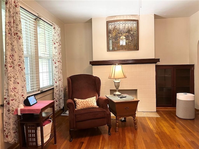 1673 Hancock Ave, Oklahoma Boro, PA 15613 - living area with hardwood / wood-style flooring and a fireplace