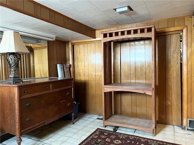 1673 Hancock Ave, Oklahoma Boro, PA 15613 - misc room featuring wooden walls and light flooring