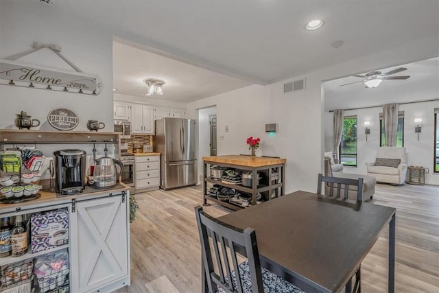 1382 Great Oak Dr, Scott Twp Sal, PA 15220 - kitchen featuring appliances with stainless steel finishes, white cabinets, light wood-type flooring, a ceiling fan, and recessed lighting