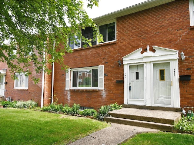 341 Macassar Dr, Baldwin Boro, PA 15236 - view of front of home featuring a front yard and brick siding
