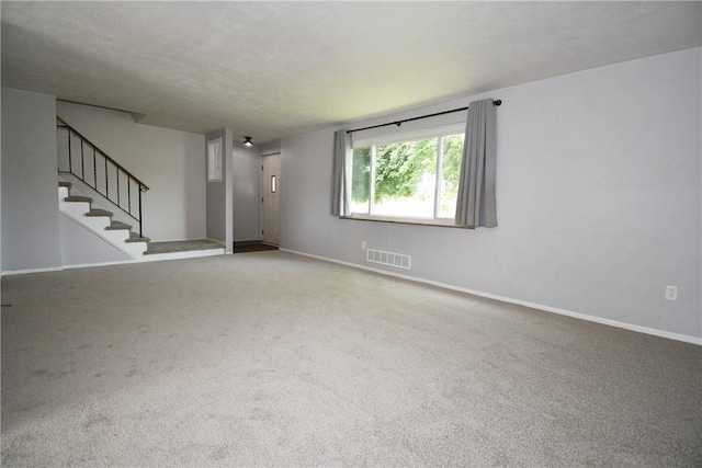 341 Macassar Dr, Baldwin Boro, PA 15236 - unfurnished living room featuring carpet, baseboards, and stairs