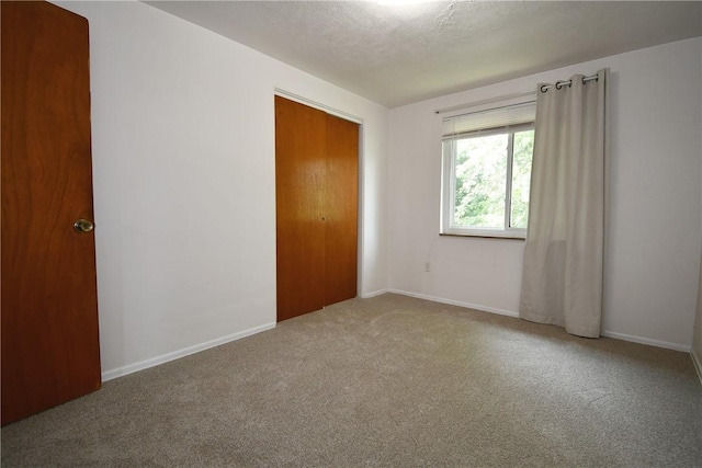 341 Macassar Dr, Baldwin Boro, PA 15236 - unfurnished bedroom with carpet, baseboards, and a closet