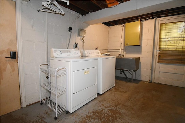 341 Macassar Dr, Baldwin Boro, PA 15236 - laundry area with independent washer and dryer and concrete block wall