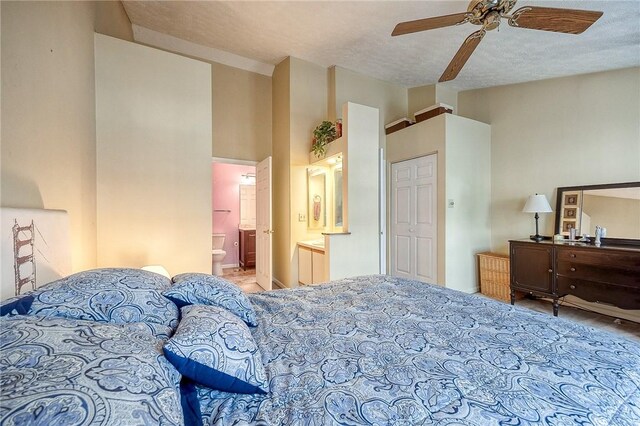 112 Rossmor Ct, Ross Twp, PA 15229 - bedroom featuring ensuite bath, wood finished floors, and a ceiling fan