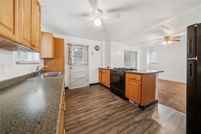 1124 Ridgeland Dr, Marshall Shadeland, PA 15212 - kitchen featuring black appliances, a ceiling fan, a sink, a peninsula, and dark countertops