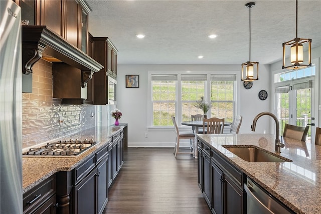 5023 Kensington Dr, Cecil, PA 15317 - kitchen featuring a sink, appliances with stainless steel finishes, dark wood-type flooring, recessed lighting, and tasteful backsplash