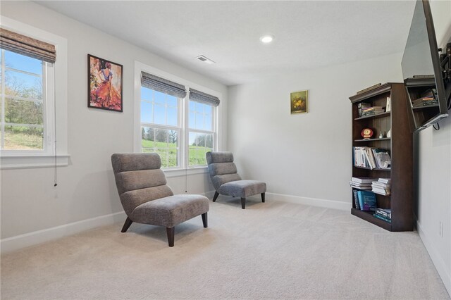5023 Kensington Dr, Cecil, PA 15317 - living area with healthy amount of natural light, carpet, baseboards, and recessed lighting