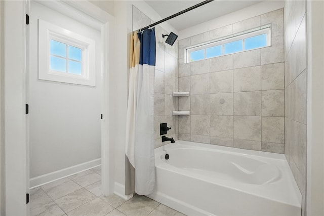 5023 Kensington Dr, Cecil, PA 15317 - full bathroom featuring plenty of natural light, shower / bath combo with shower curtain, baseboards, and tile patterned flooring