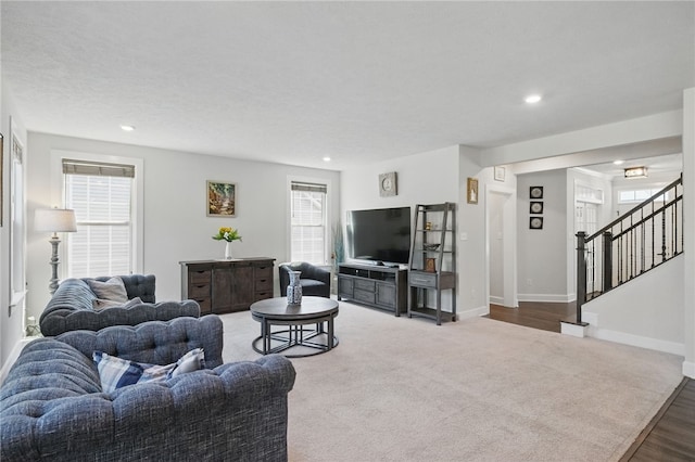 5023 Kensington Dr, Cecil, PA 15317 - living room with stairs, baseboards, recessed lighting, and wood finished floors