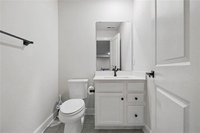 5023 Kensington Dr, Cecil, PA 15317 - half bath with vanity, toilet, baseboards, and tile patterned flooring