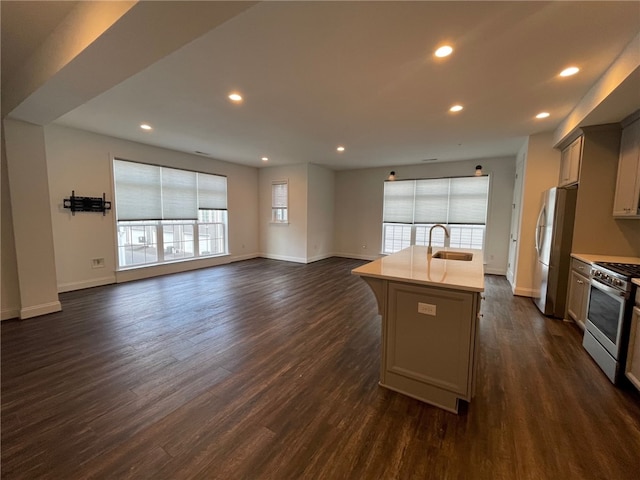 2122 Westcott Ln, South Fayette, PA 15017 - kitchen featuring a sink, appliances with stainless steel finishes, light countertops, recessed lighting, and open floor plan