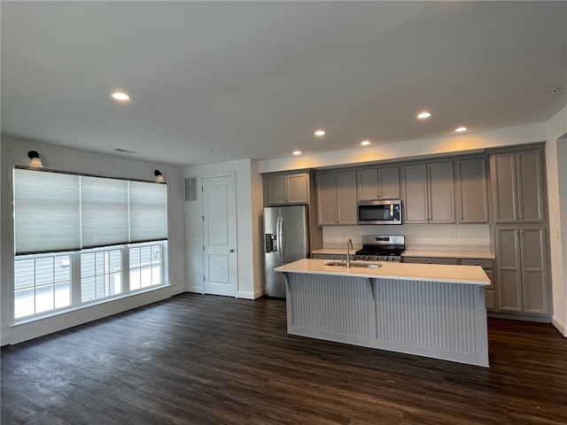 2122 Westcott Ln, South Fayette, PA 15017 - kitchen with stainless steel appliances, gray cabinetry, a sink, light countertops, and recessed lighting