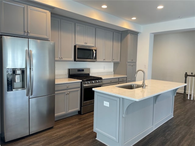 2122 Westcott Ln, South Fayette, PA 15017 - kitchen featuring stainless steel appliances, a sink, gray cabinetry, dark wood-style flooring, and recessed lighting