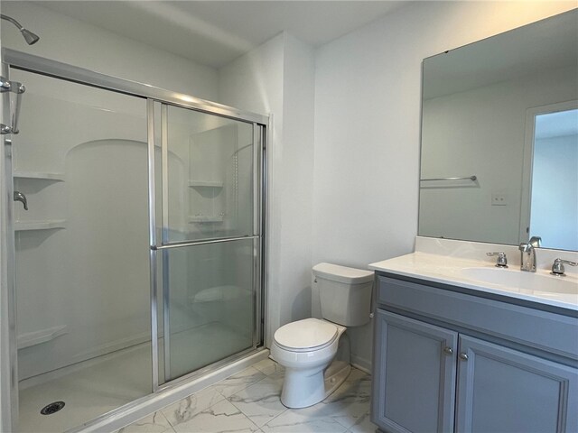 2122 Westcott Ln, South Fayette, PA 15017 - full bathroom featuring marble finish floors, a stall shower, toilet, and vanity