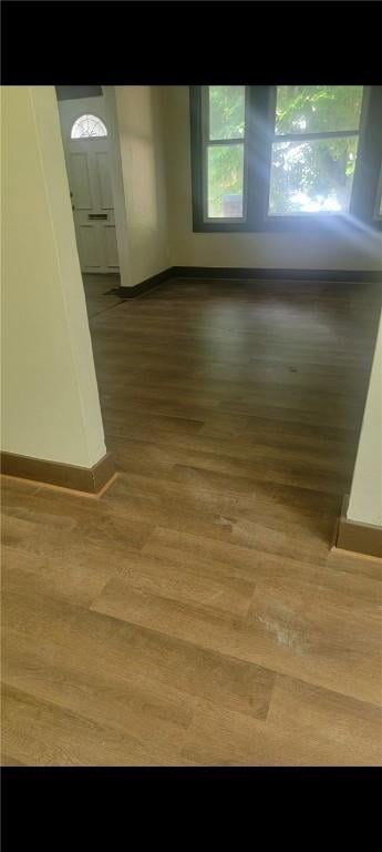 2722 Bethesda St, Carrick, PA 15227 - spare room with baseboards and wood finished floors