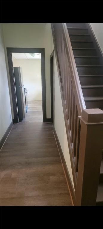 2722 Bethesda St, Carrick, PA 15227 - stairs with baseboards and wood finished floors