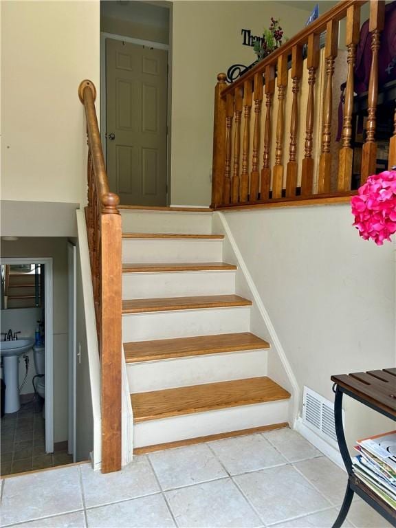 5936 Leprechaun Dr, Bethel Park, PA 15102 - staircase with tile patterned flooring