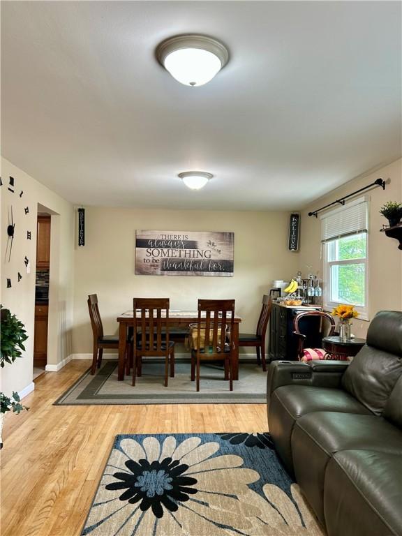 5936 Leprechaun Dr, Bethel Park, PA 15102 - living area with light wood finished floors and baseboards