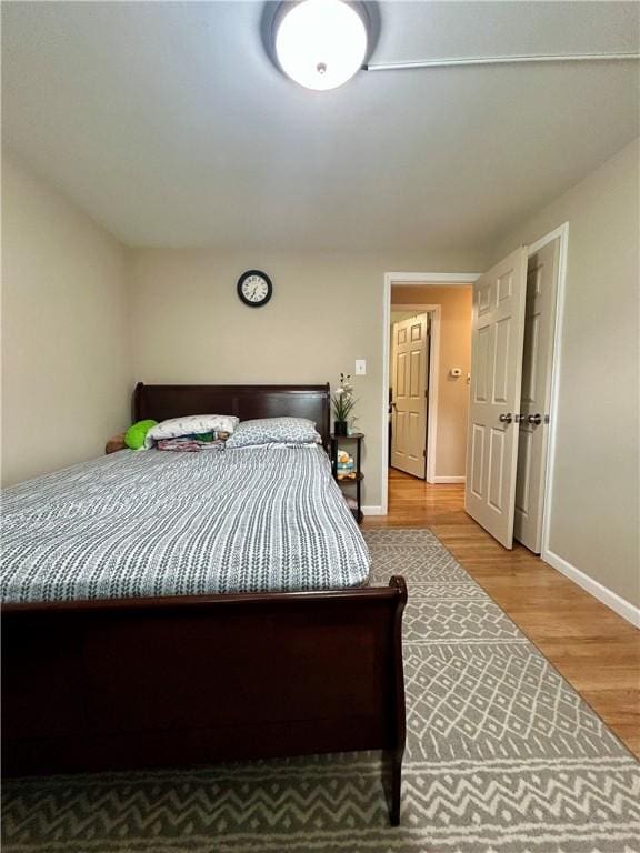 5936 Leprechaun Dr, Bethel Park, PA 15102 - bedroom with wood finished floors and baseboards