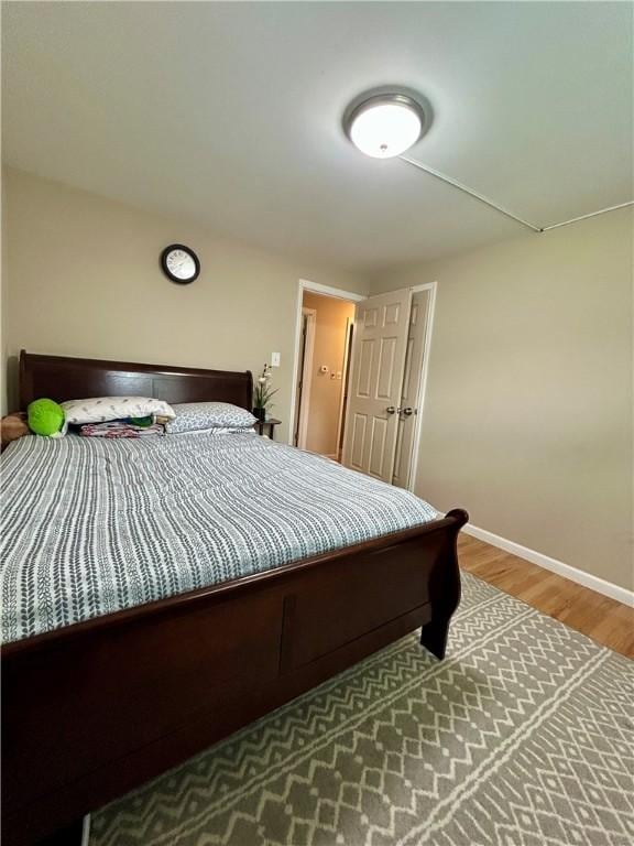5936 Leprechaun Dr, Bethel Park, PA 15102 - bedroom featuring wood finished floors and baseboards