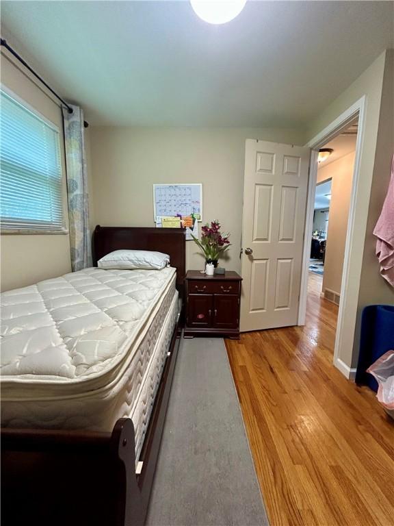 5936 Leprechaun Dr, Bethel Park, PA 15102 - bedroom featuring wood finished floors