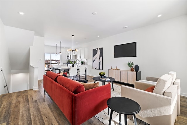 2127 Rose St, Hill District, PA 15219 - living room featuring wood finished floors, recessed lighting, a chandelier, and baseboards