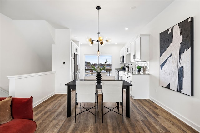 2127 Rose St, Hill District, PA 15219 - dining space featuring dark wood finished floors, a chandelier, baseboards, and recessed lighting